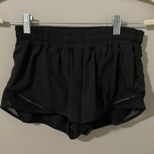 Running shorts w/built-in underwear. Black